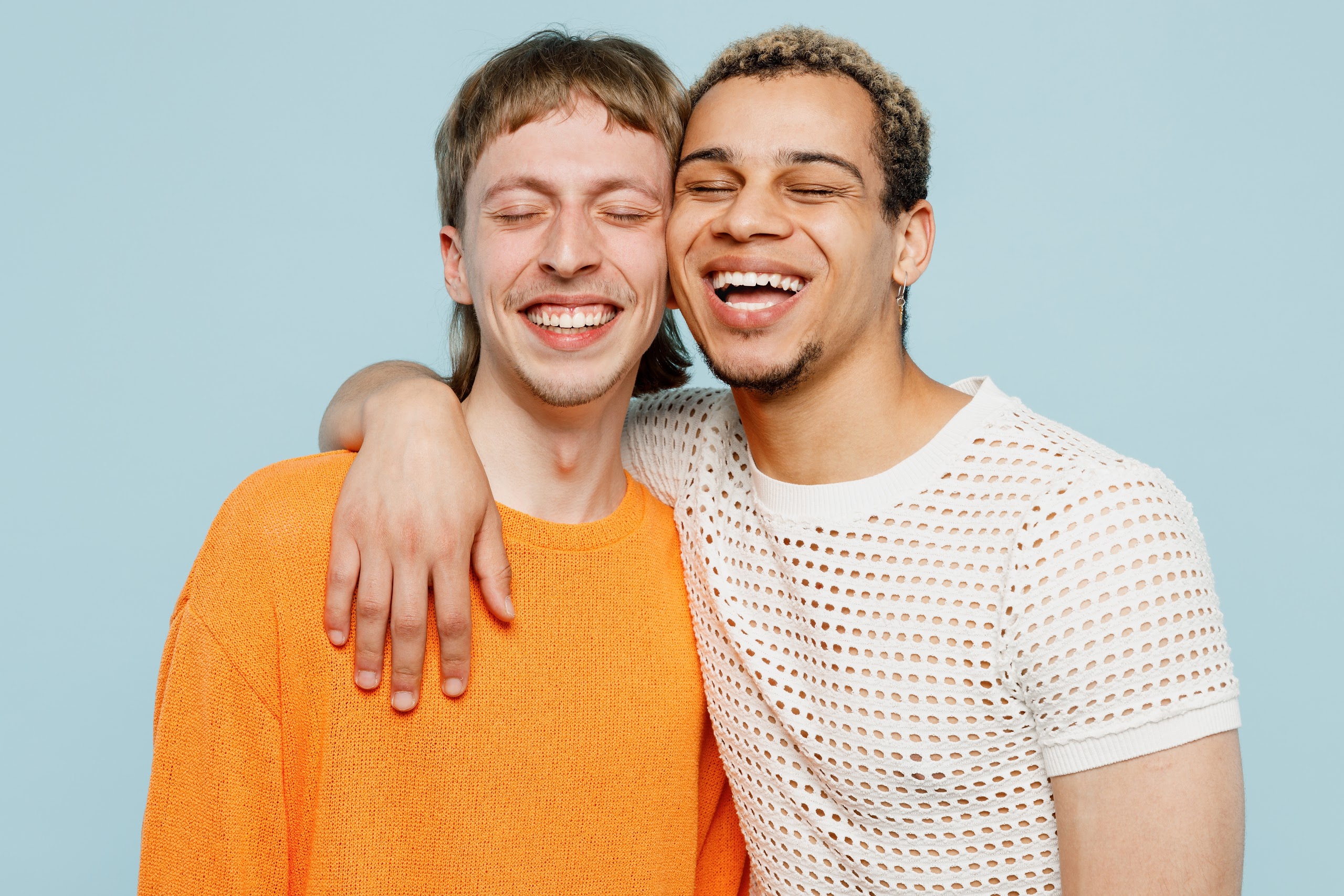 Two friends laughing together